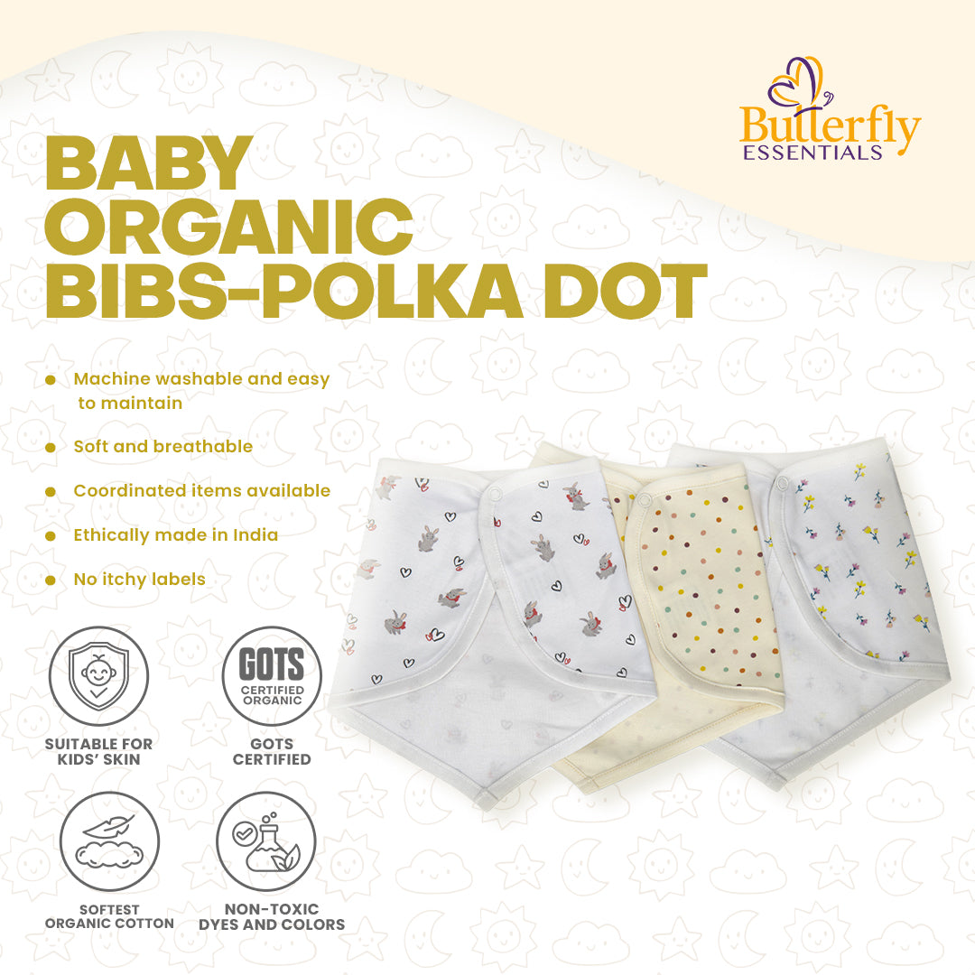 Baby organic bibs with polka dot pattern on a white background, featuring the Butterfly Essentials.