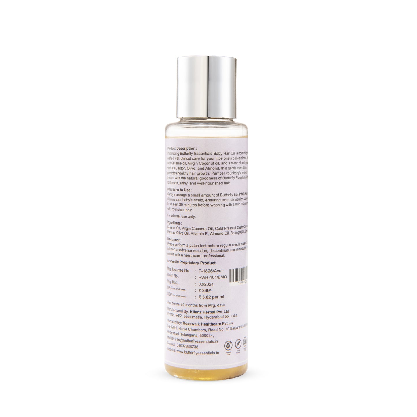 Bottle of Hair Oil with a silver cap on a white background