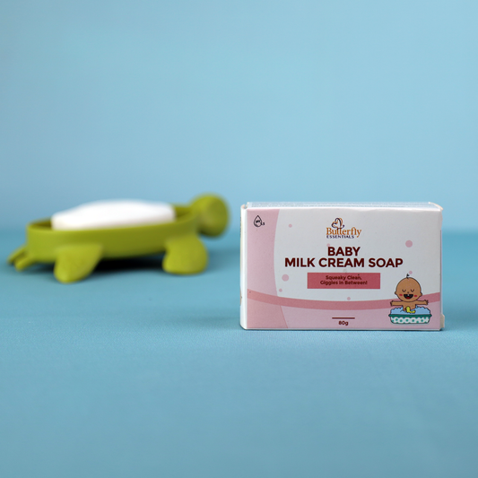 Box of Butterfly Baby Milk Cream Soap on a blue background