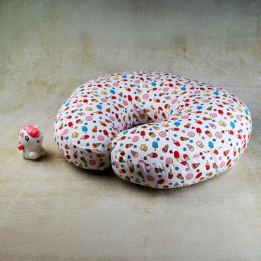 Patterned U-shaped or Feeding pillow on a textured surface