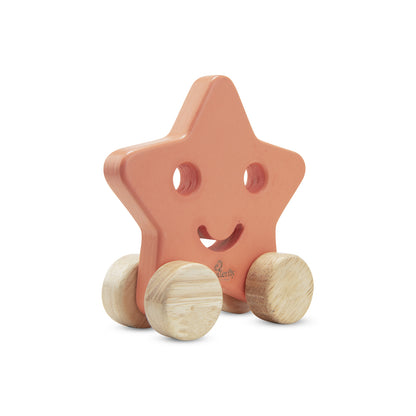 Star-shaped wooden toy with wheels on a white background